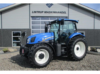 New Holland T6050 Delte med frontlift  - Trattore: foto 1