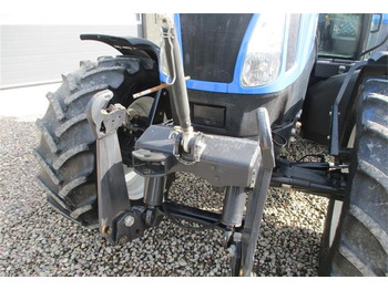 New Holland T6050 Delte med frontlift  - Trattore: foto 4