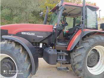 NEW HOLLAND M100 - trattore agricolo