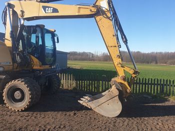 Escavatore gommato CATERPILLAR CAT M313D