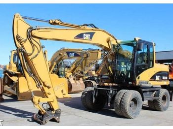 Escavatore gommato CATERPILLAR M313C