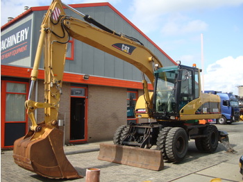 Escavatore gommato CATERPILLAR M316C