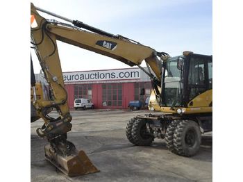 Escavatore gommato CAT M313D