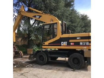 Escavatore gommato CAT M318
