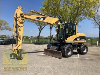 Escavatore gommato Caterpillar M313C
