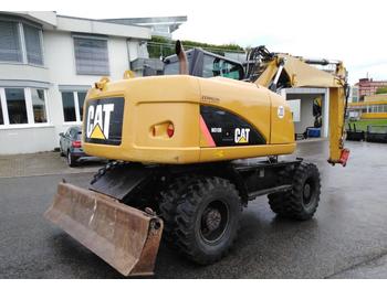 Escavatore gommato Caterpillar M 313 D