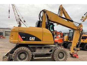 Escavatore gommato Caterpillar M 313 D