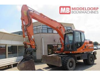 Escavatore gommato Doosan DX 140 W