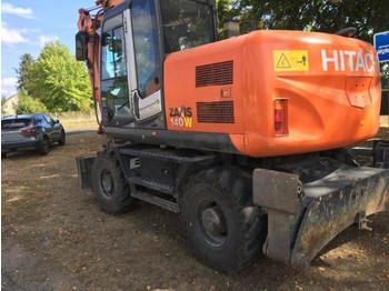 Escavatore gommato Hitachi ZX140W-3