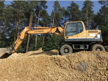 Escavatore gommato Hyundai 140W-9