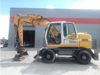 Escavatore gommato LIEBHERR A314