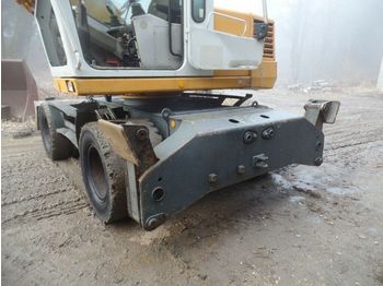 Escavatore gommato Liebherr 312