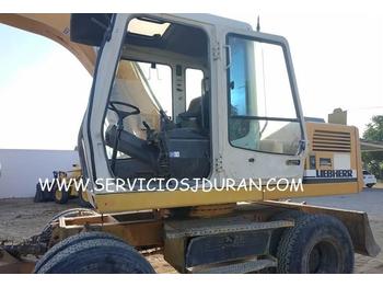 Escavatore gommato Liebherr A 900 Litronic