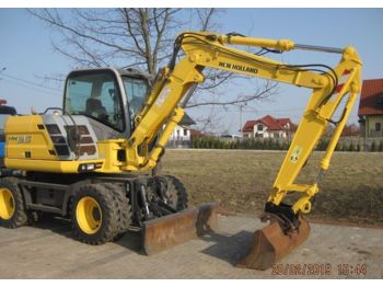Escavatore gommato NEW HOLLAND MH2,6