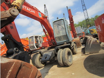 Escavatore gommato HITACHI EX100WD: foto 1