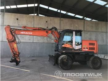 Escavatore gommato Hitachi Zx140w-3: foto 1