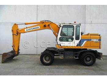 Escavatore gommato Hyundai R120W: foto 1
