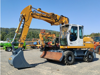 Escavatore gommato LIEBHERR A 316