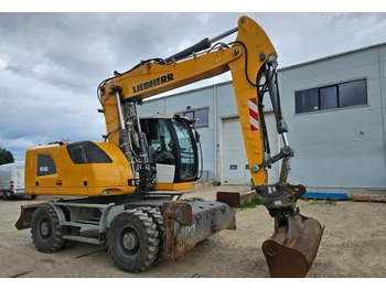 Escavatore gommato LIEBHERR A 916