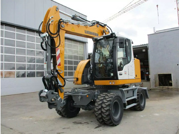 Escavatore gommato LIEBHERR A 913