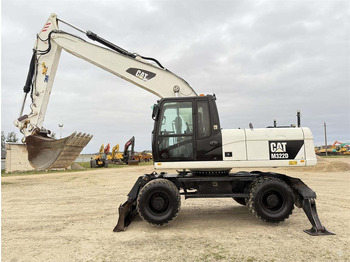Escavatore gommato CATERPILLAR M322D