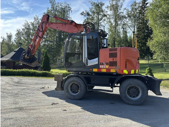 Escavatore gommato HITACHI ZX145W