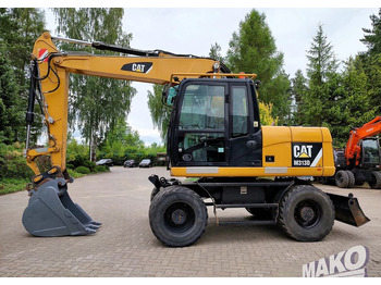 Escavatore gommato CATERPILLAR M313D