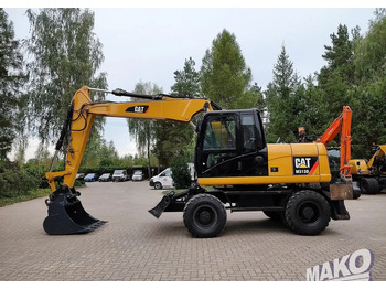 Escavatore gommato CATERPILLAR M313D