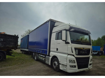 Camion centinato MAN TGX 26.460