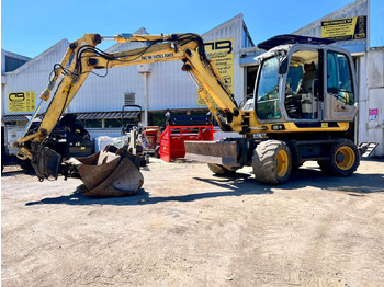 Escavatore gommato NEW HOLLAND