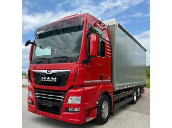 Camion centinato MAN TGX 26.500