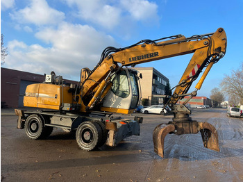 Escavatore gommato LIEBHERR A 316