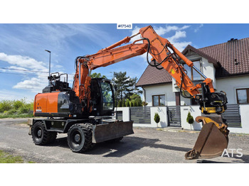Escavatore gommato HITACHI ZX140W-6