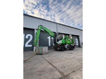 Escavatore per movimentazione SENNEBOGEN