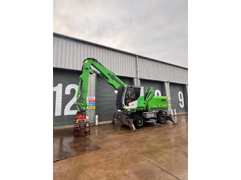 Escavatore per movimentazione SENNEBOGEN