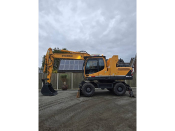 Escavatore gommato HYUNDAI