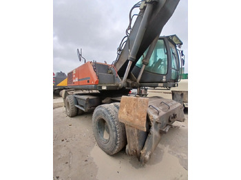 Escavatore per movimentazione ATLAS