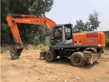 Escavatore gommato HITACHI ZX210W