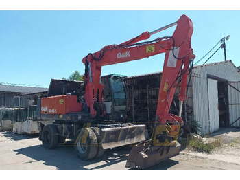 Escavatore gommato O&K