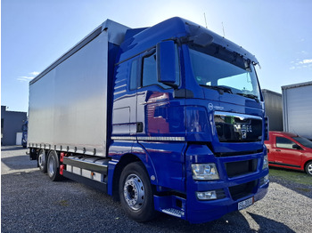 Camion centinato MAN TGX 26.440
