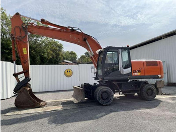 Escavatore gommato HITACHI ZX210W