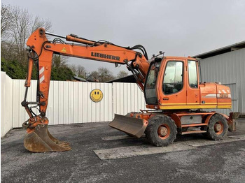 Escavatore gommato LIEBHERR A 316