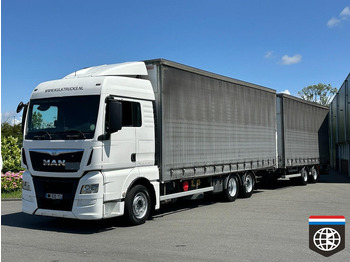 Camion centinato MAN TGX 26.480