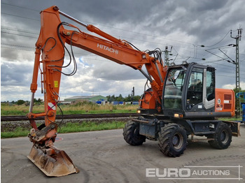 Escavatore gommato HITACHI ZX140W-3