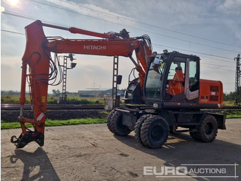 Escavatore gommato HITACHI ZX140W-3