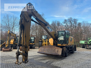 Escavatore per movimentazione CATERPILLAR MH3022