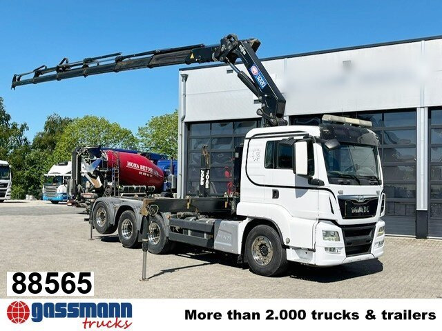 MAN TGS 35.500 8x4-4 BL, Lenk-/Liftachse, Kran HMF - Autocarro scarrabile, Camion con gru: foto 1 MAN TGS 35.500 8x4-4 BL, Lenk-/Liftachse, Kran HMF - Autocarro scarrabile, Camion con gru: foto 1