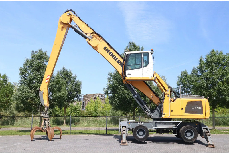 Liebherr LH 40 M LITRONIC | GRAB | QUICK COUPLER | 16 METER - Escavatore gommato: foto 1 Liebherr LH 40 M LITRONIC | GRAB | QUICK COUPLER | 16 METER - Escavatore gommato: foto 1