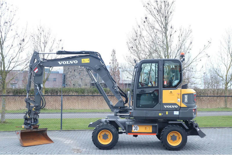 Volvo EW60E | DEMO | 30 KM/H | ROTOTILT + GRIPPER | BUCKET - Escavatore gommato: foto 1 Volvo EW60E | DEMO | 30 KM/H | ROTOTILT + GRIPPER | BUCKET - Escavatore gommato: foto 1