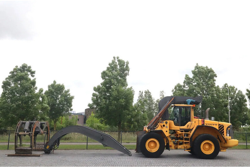 Volvo L180 F HL | HIGH-LIFT | LOG STACKER | HOLZ GRAPPLE - Pala gommata: foto 1 Volvo L180 F HL | HIGH-LIFT | LOG STACKER | HOLZ GRAPPLE - Pala gommata: foto 1